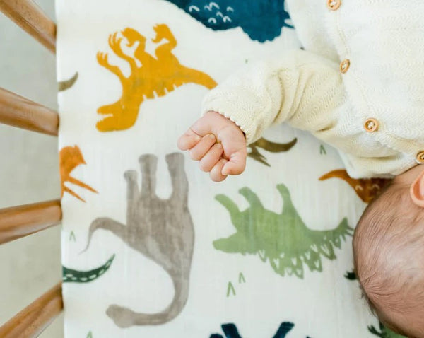 Little Unicorn Cotton Muslin Fitted Cot Sheet - Dino Friends