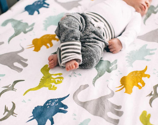 Little Unicorn Cotton Muslin Fitted Cot Sheet - Dino Friends
